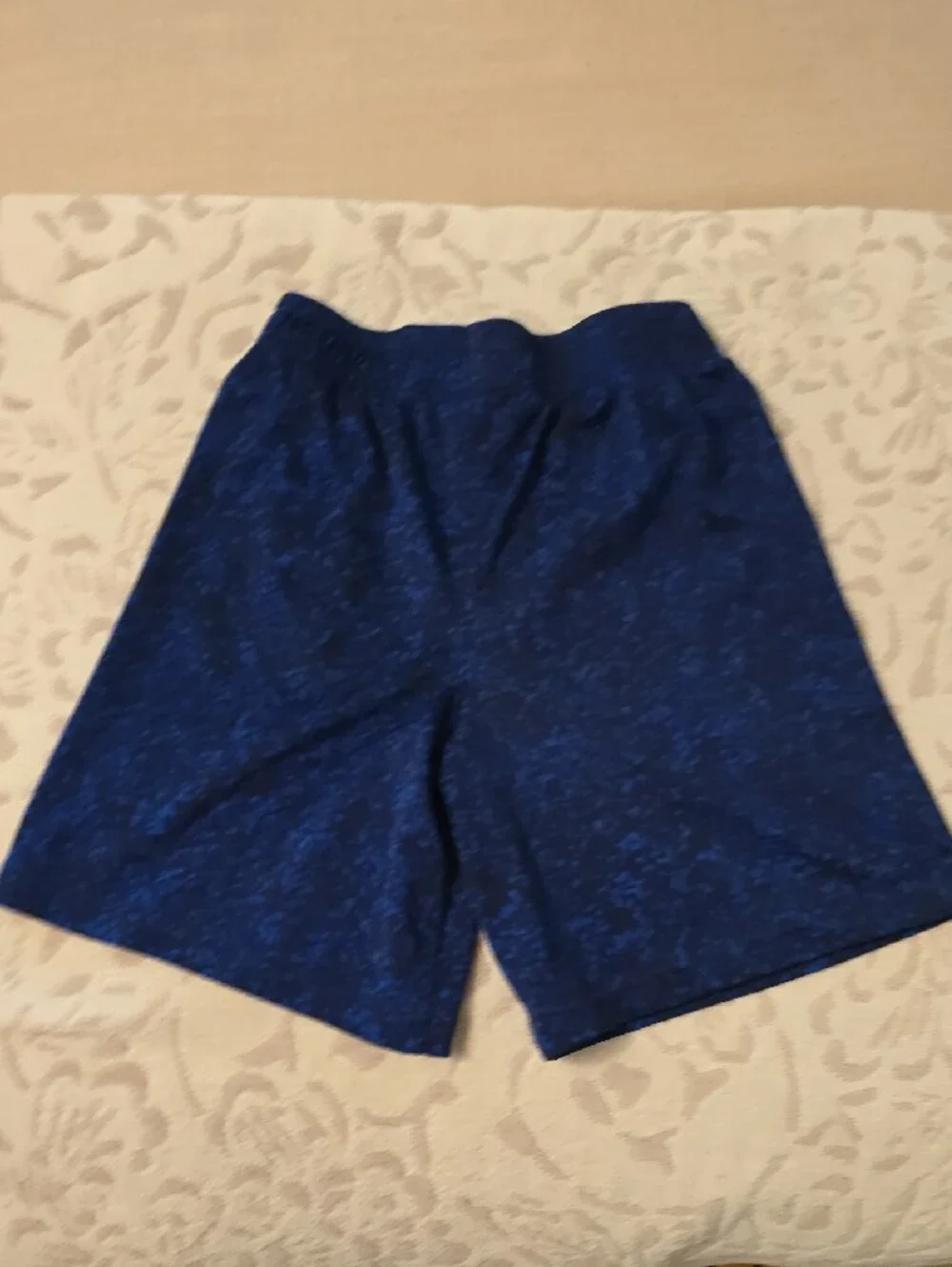 Under Armour Boy’s Navy Blue Athletic Shorts with Orange Logo